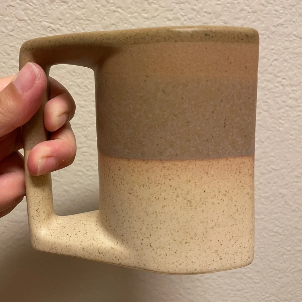 Rodolfo Padilla stacking mugs